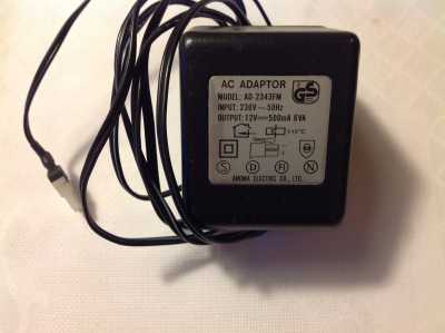 Power Supply/Netzteil AC-Adapter Model AD-2343FM